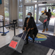 Voting boxes are brought into City Hall in Flint, Michigan October 20, 2020.